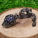 Cage pendentif tête de mort pour pierres roulées noir - 1"