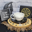 Tasse à thé révélatrice de fortune avec guide