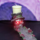 Crâne avec porte-encens roses et T-Lite / support votif - cônes / bâtons