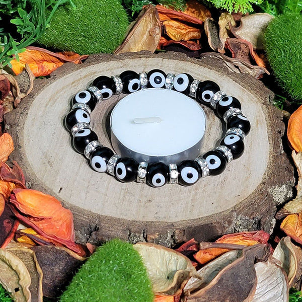 Bracelet - Perles noires Evil Eye avec perles argentées antiques